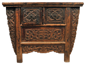 Chinese Coffee Table with three drawers having carved fronts detailing dragons and florals; carvings repeated on side embellishments. Made of elmwood, from the Shanxi province, ca. late 1700s.