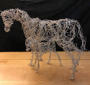 Mare and Foal (“All my wire sculptures are made of a single uncut length of 350-foot wire”).