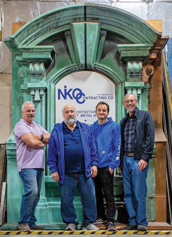 The team at NIKO (left to right): Philip Kratsas, superintendent; Nick Lardas, president; Zachary Lardas, coppersmith; Duncan MacDiarmid, artist-in-residence.